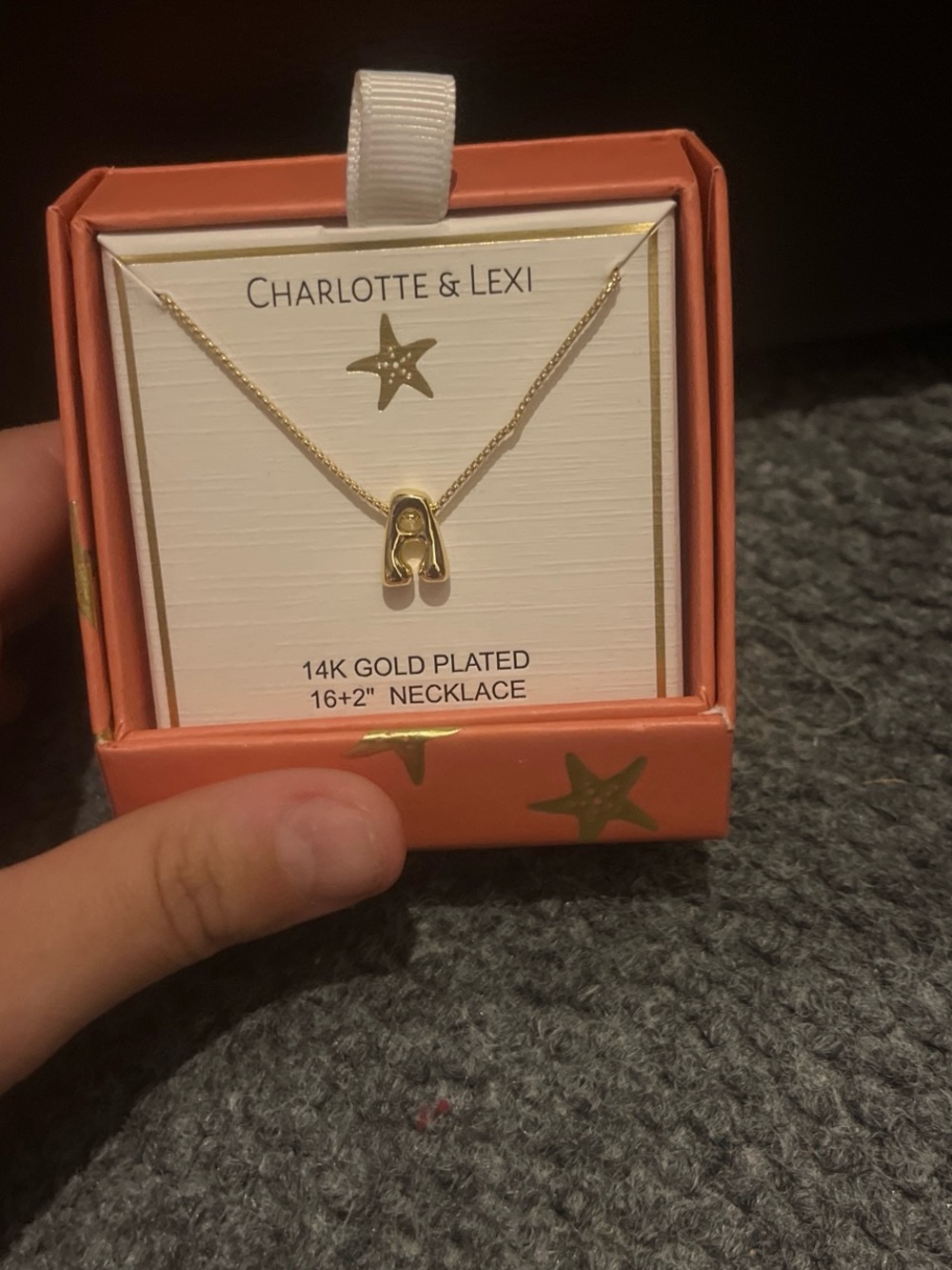 14K gold necklace with the initial “A”